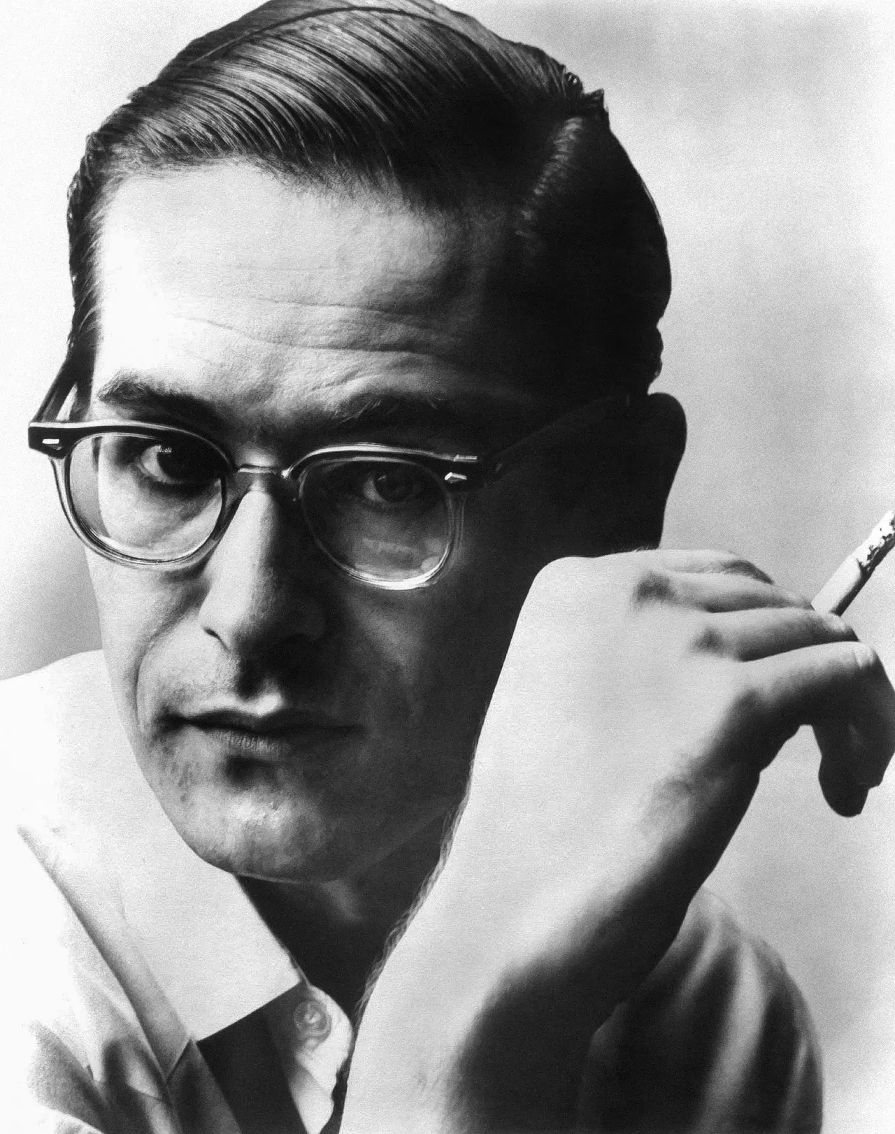 Photograph of Bill Evans at the piano.
