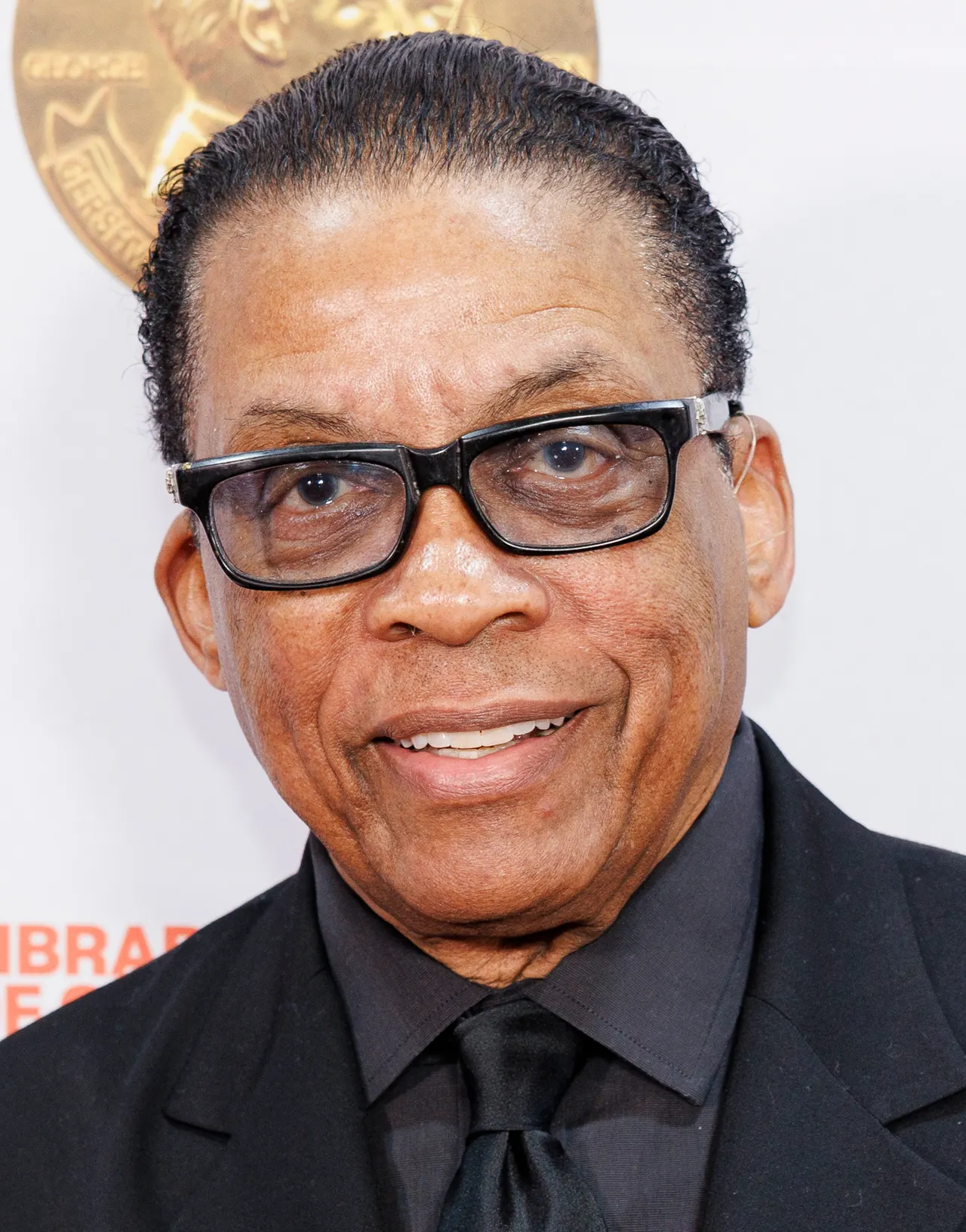 Photograph of Herbie Hancock at the piano.