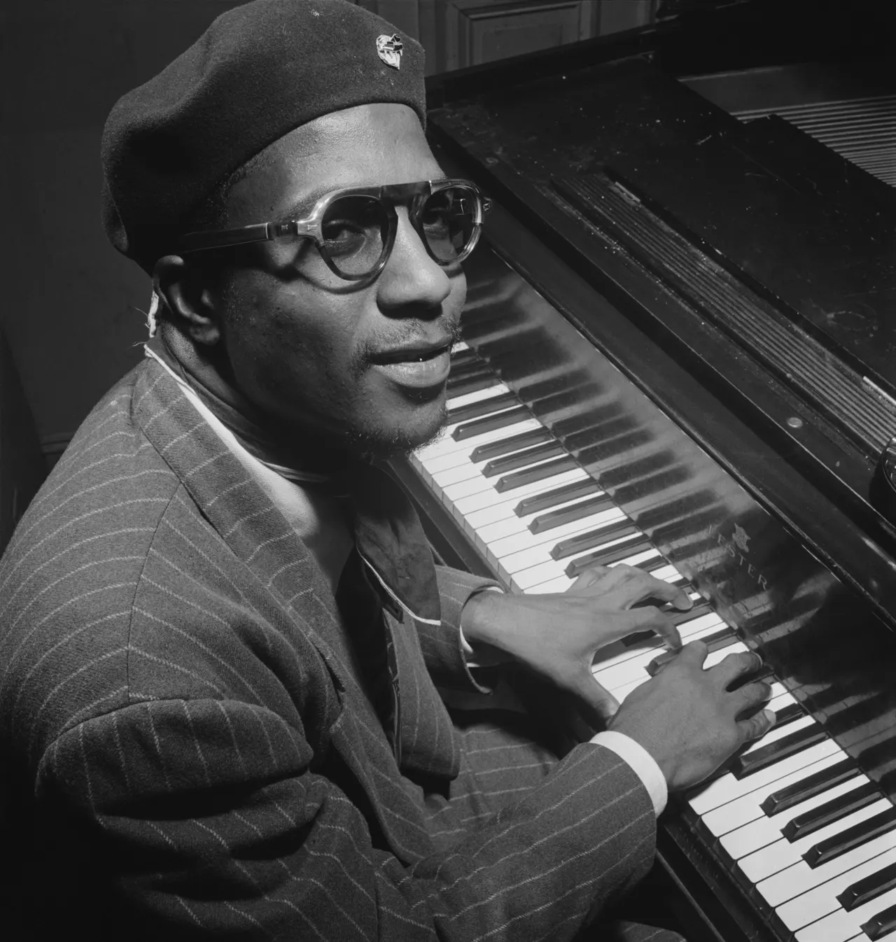 Photograph of Thelonious Monk at the piano.